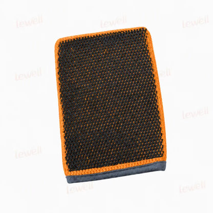 Orange clay wash mitt with textured grid surface and dark grey bottom trim.