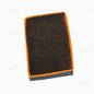 Orange clay wash mitt with textured grid surface and dark grey bottom trim.