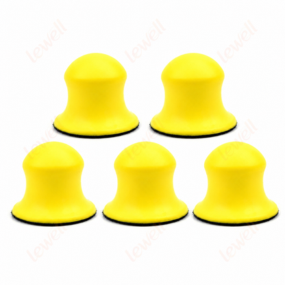 Set of yellow hook-and-loop sanding pads with domed foam tops