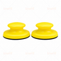 Two yellow handheld sanding blocks with domed foam tops and black bottoms