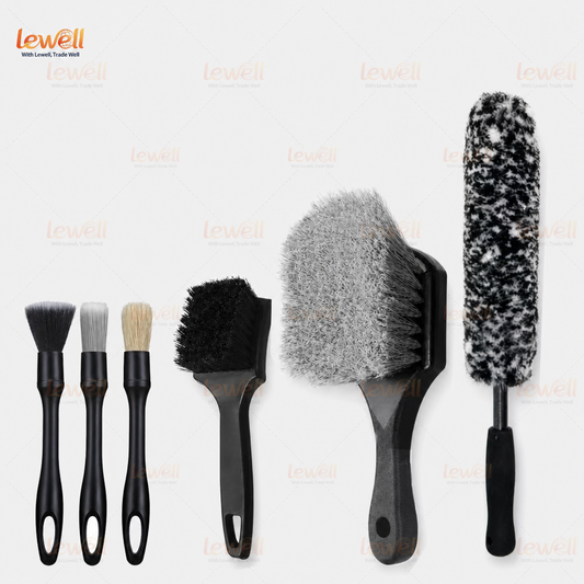 Assorted wheel cleaning brushes with black handles and mixed bristle textures