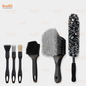 Assorted wheel cleaning brushes with black handles and mixed bristle textures