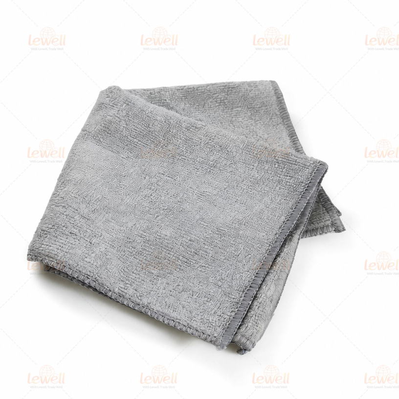 Gray microfiber cleaning cloth stack, folded square with textured weave