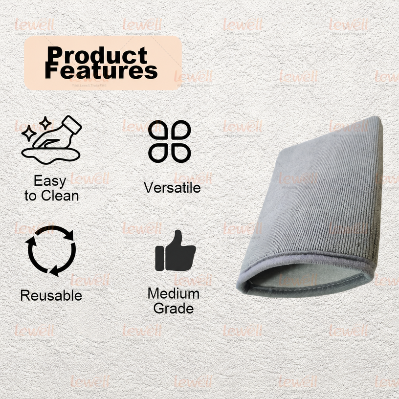 Grey clay wash mitt with textured grid surface and folded edge.