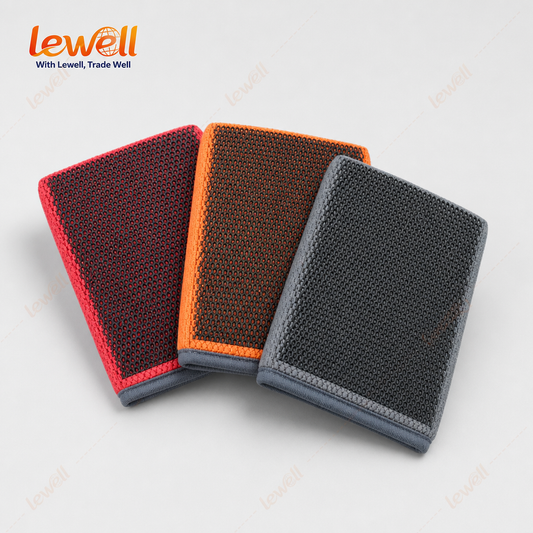 Three clay wash mitts in red, orange, and dark grey with grid texture and blue edging.
