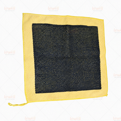 Yellow clay decontamination towel with black honeycomb pad and hanging loop