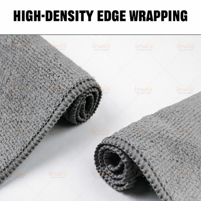 Gray microfiber cleaning cloth with tightly wrapped edge, rolled hem detail
