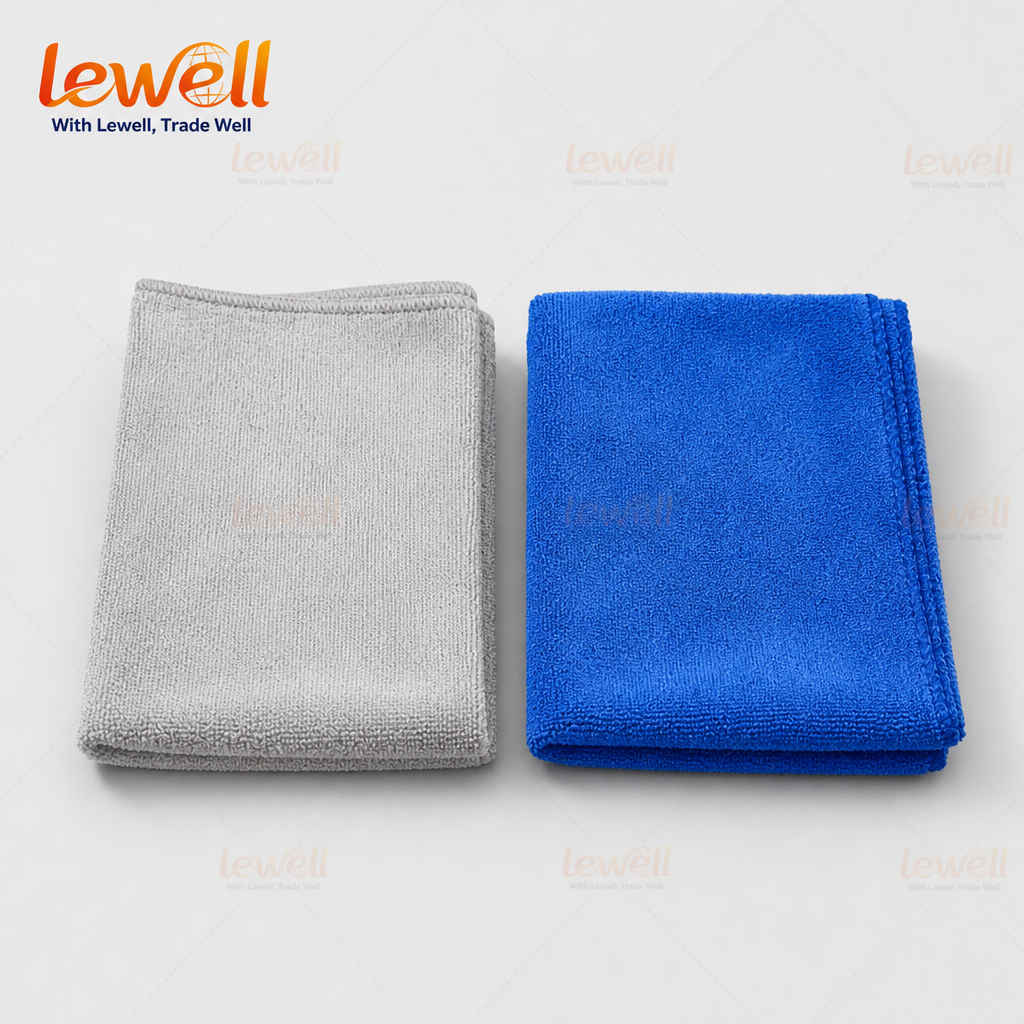 Set of gray and blue microfiber cleaning cloths, neatly folded