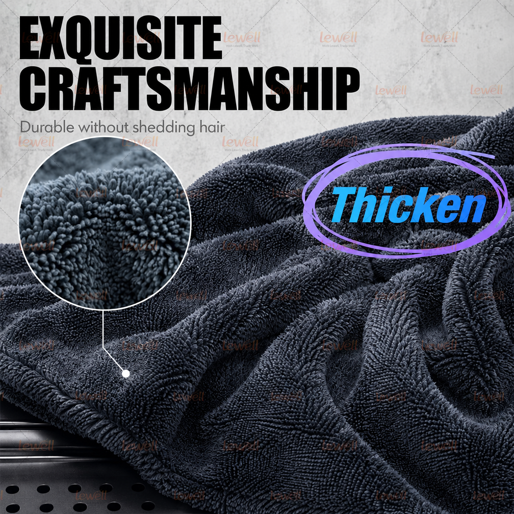 Gray twisted-loop microfiber car drying towel with dense pile texture close-up