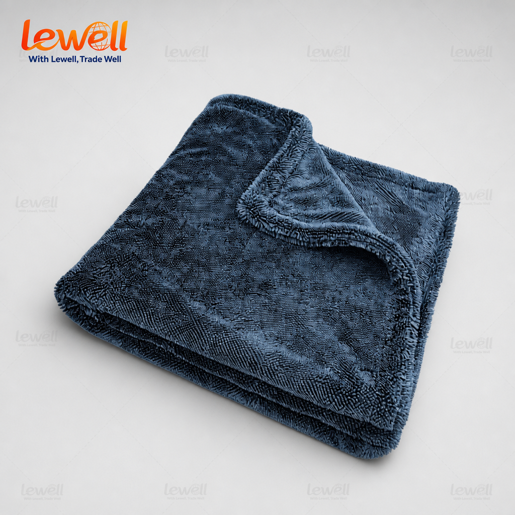 Gray twisted-loop car drying towel, neatly folded with curved corner edge