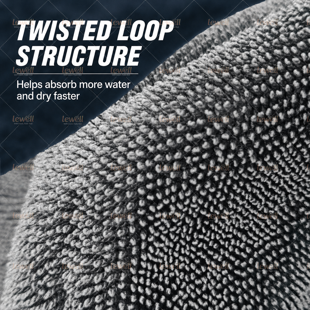 Gray twisted-loop microfiber towel surface close-up, textured loop pile