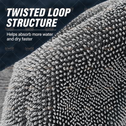 Gray twisted-loop microfiber towel surface close-up, textured loop pile