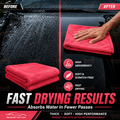 Car drying towel, red microfiber towel folded, with hand holding it