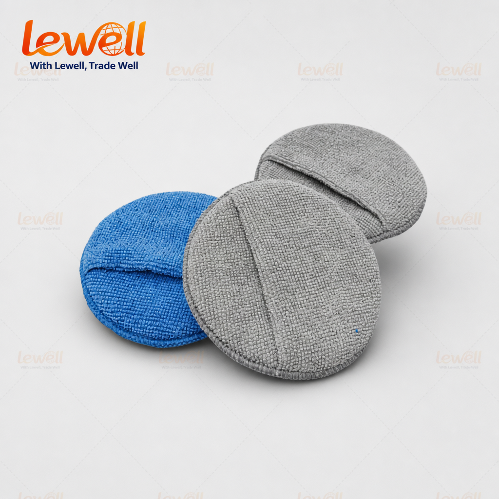 Round microfiber wax pads in gray and blue, textured terry finish