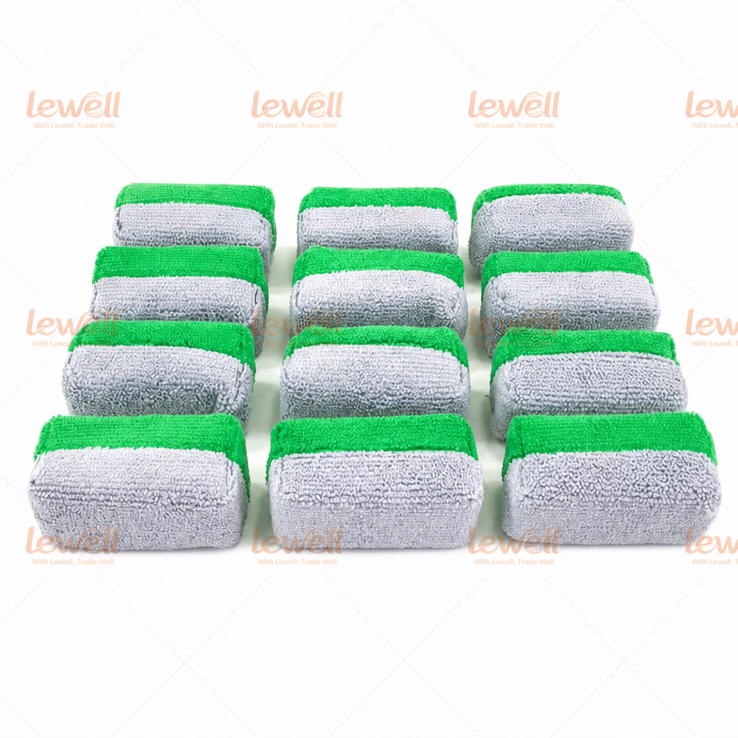 Green-and-white striped microfiber detailing applicator sponge block set, neatly stacked